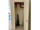 A storage closet with shelving and a vacuum cleaner is ideal for organization and convenience at 1885 Vass Springs Pl, North Las Vegas, NV 89084