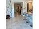 Open-concept living area offers seamless transition to the kitchen and dining area at 1885 Vass Springs Pl, North Las Vegas, NV 89084