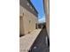 Gravel side yard providing extra space between homes and easy access to the backyard at 1885 Vass Springs Pl, North Las Vegas, NV 89084