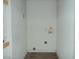 Small, empty laundry room with white walls at 1912 Statz St, North Las Vegas, NV 89030