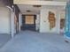 Spacious room featuring peeling paint and boarded up window at 1912 Statz St, North Las Vegas, NV 89030
