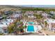 Aerial view of condo community featuring a pool and desert landscape at 1944 Las Palmas Ln # 174, Laughlin, NV 89029