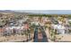 An aerial view of an apartment complex showcasing palm trees and a desert landscape at 1944 Las Palmas Ln # 174, Laughlin, NV 89029