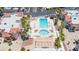 Elevated view of community with multiple pools, lush landscaping and beautiful buildings at 1944 Las Palmas Ln # 174, Laughlin, NV 89029