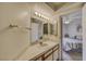 Bathroom vanity with an open view to the primary bedroom at 1944 Las Palmas Ln # 174, Laughlin, NV 89029