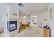 Dining and living area with carpet, fireplace, and a dining set for casual meals at 1944 Las Palmas Ln # 174, Laughlin, NV 89029