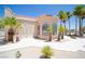 Exterior of community clubhouse showcasing architecture and desert landscaping at 1944 Las Palmas Ln # 174, Laughlin, NV 89029