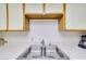 Close-up of the kitchen sink area, highlighting the ample counter space and storage at 1944 Las Palmas Ln # 174, Laughlin, NV 89029