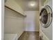 Convenient laundry room with side by side washer and dryer units at 1944 Las Palmas Ln # 174, Laughlin, NV 89029