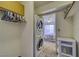 In-unit laundry space featuring a stackable washer and dryer at 1944 Las Palmas Ln # 174, Laughlin, NV 89029