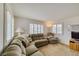 Inviting living room with cozy carpet, natural light, and comfortable seating area at 1944 Las Palmas Ln # 174, Laughlin, NV 89029