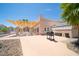 Outdoor patio area featuring a grill, seating, and desert landscaping at 1944 Las Palmas Ln # 174, Laughlin, NV 89029