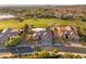 Beautiful home with a tile roof, desert landscaping, and golf course view at 20 Kittansett Loop, Henderson, NV 89052