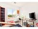 Bright bonus room area with mountain views, desk, TV, and kid friendly activities at 20 Kittansett Loop, Henderson, NV 89052