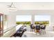 Bright dining area features a glass topped bar with ample seating and scenic views of the city and mountains at 20 Kittansett Loop, Henderson, NV 89052
