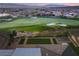 Picturesque view of lush golf course and meticulously maintained greenbelt from the home's rooftop at 20 Kittansett Loop, Henderson, NV 89052