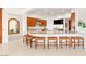 Bright, spacious kitchen featuring granite countertops, stainless steel appliances, and seating for six at 20 Kittansett Loop, Henderson, NV 89052