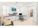 Bright home office area with built in desk, cabinets, and comfy reclining chair at 20 Kittansett Loop, Henderson, NV 89052