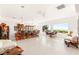 Spacious recreation room with a full bar, ample seating, and scenic outdoor views at 20 Kittansett Loop, Henderson, NV 89052