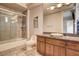 Bright bathroom featuring a shower over tub, granite counters, and a decorative vessel sink at 205 Red Rock Rd, Boulder City, NV 89005