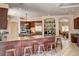 Open concept kitchen with island seating and stainless steel appliances at 205 Red Rock Rd, Boulder City, NV 89005