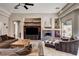 Cozy living room featuring a fireplace, built-in media center, and comfortable seating at 205 Red Rock Rd, Boulder City, NV 89005