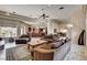 Comfortable living room showcasing an open-concept floor plan, neutral tones and tile flooring at 205 Red Rock Rd, Boulder City, NV 89005