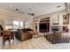 Bright living room featuring a fireplace, open layout, and tile floors at 205 Red Rock Rd, Boulder City, NV 89005