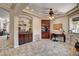 Bright room with custom built-ins and an adjacent bar area provides ample storage and functionality at 205 Red Rock Rd, Boulder City, NV 89005
