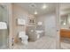 Spacious bathroom featuring a toilet, shower, and soaker tub at 211 E Flamingo Rd # 1617, Las Vegas, NV 89169