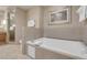 Oversized soaking tub with jets in a bright bathroom at 211 E Flamingo Rd # 1617, Las Vegas, NV 89169