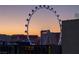 Close-up on High Roller ferris wheel with bright lights at dusk at 211 E Flamingo Rd # 1617, Las Vegas, NV 89169