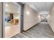 Inviting hallway leading to a modern condo featuring neutral tones and stylish carpeting at 211 E Flamingo Rd # 1617, Las Vegas, NV 89169