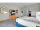 Bright main bedroom with entertainment center and ensuite bathroom at 211 E Flamingo Rd # 1617, Las Vegas, NV 89169