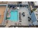 Luxurious rooftop pool area with lounge chairs and umbrellas, offering a resort-style experience and urban views at 211 E Flamingo Rd # 1617, Las Vegas, NV 89169