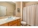 This bathroom features a tub and shower combo with neutral tones and a small vanity at 2144 Marywood Park Ct, Henderson, NV 89044