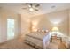Bedroom features neutral walls, ceiling fan, and well-placed lighting at 2144 Marywood Park Ct, Henderson, NV 89044