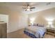 Relax in this bedroom with a ceiling fan, closet, and neutral tones with natural light at 2144 Marywood Park Ct, Henderson, NV 89044