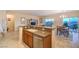 View of the kitchen with granite countertops, stainless steel appliances, and a dining area at 2144 Marywood Park Ct, Henderson, NV 89044