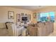 Cozy living room with comfortable seating and large window at 2144 Marywood Park Ct, Henderson, NV 89044