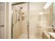 This primary bathroom features a stand up shower with glass doors and neutral tones at 2144 Marywood Park Ct, Henderson, NV 89044