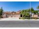 Charming single-story home features a three-car garage and well-manicured front yard with mature landscaping at 2200 Valley Heights Ave, Henderson, NV 89052
