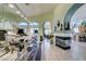 Spacious living area with fireplace, arched doorway and parquet flooring at 2200 Valley Heights Ave, Henderson, NV 89052