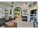 Spacious living room features a fireplace, open archways, and a decorative entertainment center at 2200 Valley Heights Ave, Henderson, NV 89052