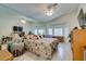 Light and bright main bedroom features an expansive mirror and ample natural lighting at 2200 Valley Heights Ave, Henderson, NV 89052