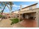 This backyard has an easy to care for yard, patio with cover, and a refrigerator at 2507 Albemarle Way, Henderson, NV 89014
