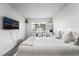Bright bedroom with a large bed, workspace, and a window with natural light at 2507 Albemarle Way, Henderson, NV 89014