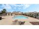 Enjoy the community pool with plenty of seating for relaxing at 2507 Albemarle Way, Henderson, NV 89014