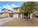 Charming two-story home with a well-maintained front yard and long driveway at 2507 Albemarle Way, Henderson, NV 89014