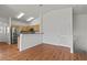 Modern kitchen features stainless steel appliances, wood cabinets, and breakfast bar at 2596 Lazy Saddle Dr, Henderson, NV 89002
